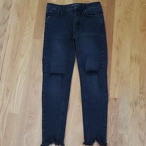 Black distressed skinny jeans